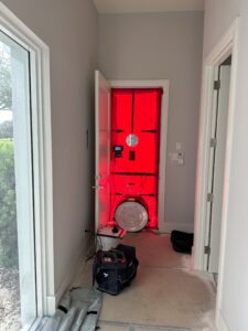 Blower Door Panel Setup in a new custom home preparing for certificate of occupancy